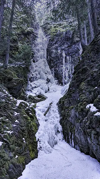 Winter waterfall landscape photo improved with a mobile app editing tool