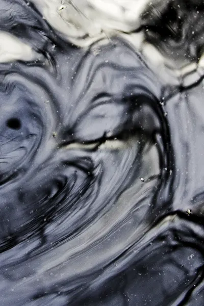 water reflections in phone photography - reflections in a garbage can